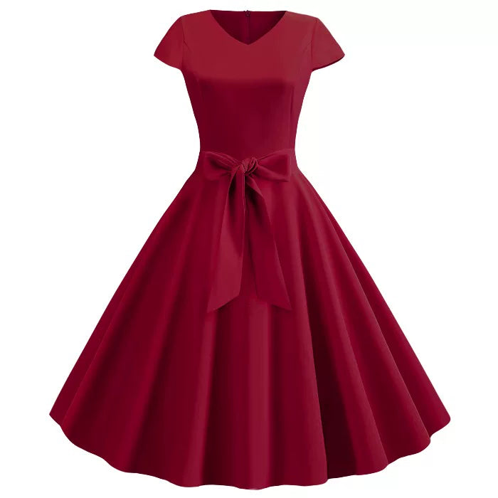 Koralorange vintage-kjole med feminin silhuet — Nordleva