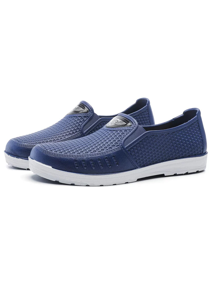 Marineblå Herre Slip-On Sko Båret Til Jeans, Bagfra — Nordleva