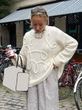 Strikbluse Med Blomstret Struktur